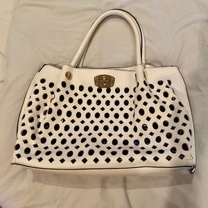 Two white bags with gold accents